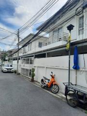 Exterior view of the property with vehicles parked outside