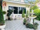 Outdoor garden area with plants and fountain