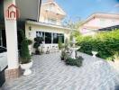 Outdoor garden patio with decorative plants and fountain