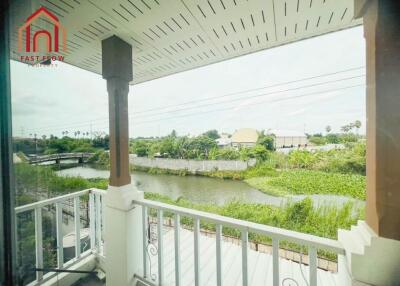 view from the balcony overlooking a canal