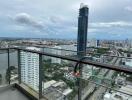 High-rise balcony with city and river view