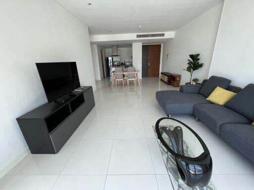 Modern living room with open space to dining area and kitchen