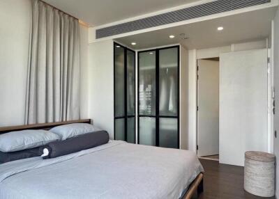 Modern bedroom with bed and closet