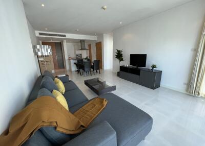 Spacious modern living room with stylish furniture.