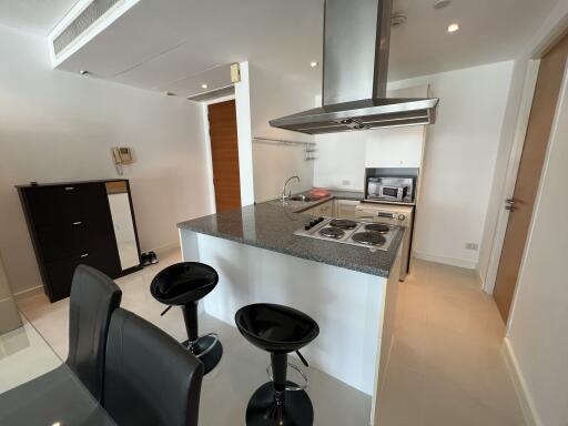 Modern kitchen with breakfast bar and appliances