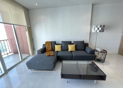 Modern living room with gray sectional sofa