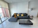 Modern living room with gray sectional sofa