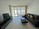 Modern living room with large windows and city view