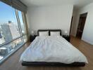 Spacious bedroom with city view