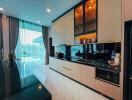 Modern kitchen with built-in appliances and island counter