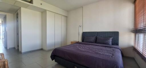 Modern bedroom with natural light and fitted wardrobes