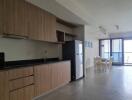 Open plan kitchen and living area with natural light