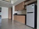 Modern kitchen with wooden cabinetry and appliances