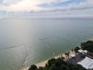 View from building showing beachfront and ocean