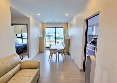 Wide angle view of the main living space with natural light