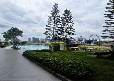 Outdoor area with pool and playground