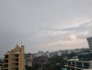 Overview of residential and commercial buildings with cloudy sky