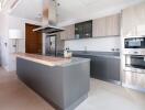 Modern kitchen with island and built-in appliances