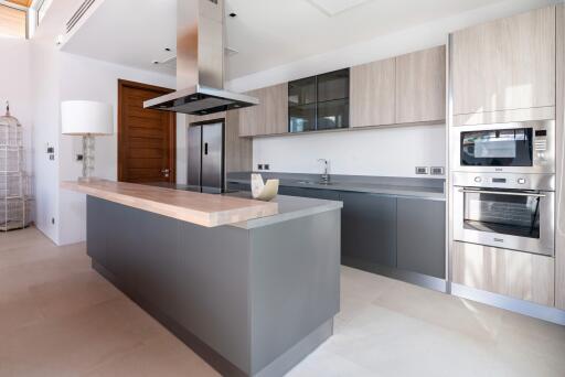 Modern kitchen with island and built-in appliances