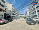 Outdoor view of apartments with parked cars