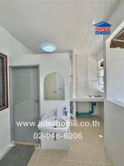 Bathroom with sink, mirror, and shower