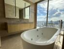 Luxurious bathroom with a large bathtub and a scenic city view