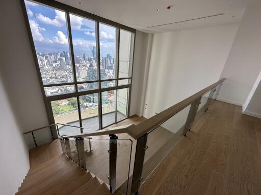 Spacious room with city skyline view