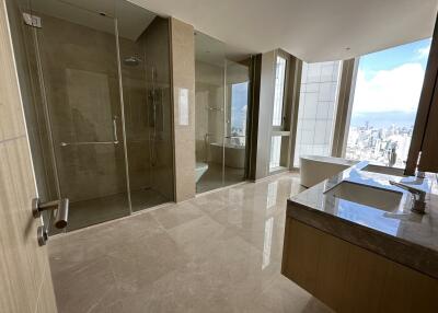 Spacious modern bathroom with city view