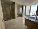 Spacious modern bathroom with city view