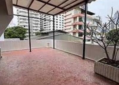 Spacious terrace with view of surrounding buildings