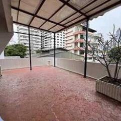 Spacious terrace with view of surrounding buildings