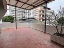 Spacious terrace with view of surrounding buildings