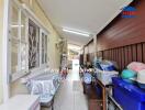 View of a corridor with storage and laundry area