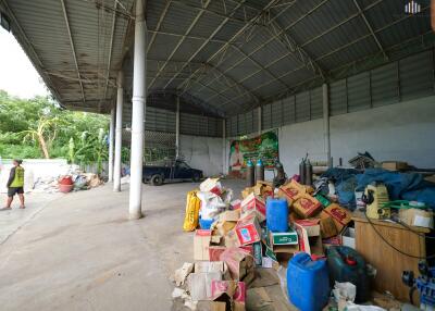 Large covered open area with storage and various items