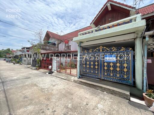 Front view of residential building with gate