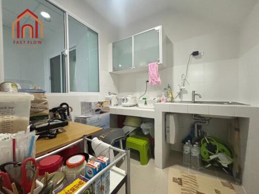 Modern kitchen with storage and washing area