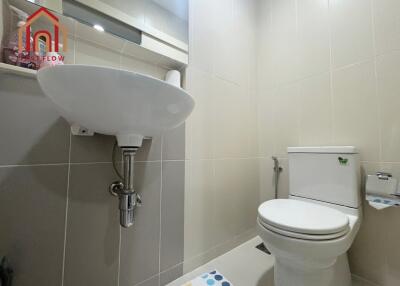 Clean and modern bathroom with white fixtures