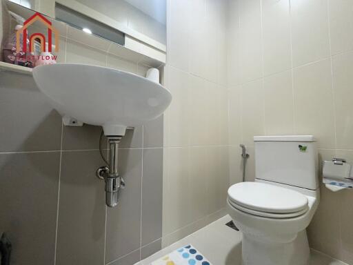 Clean and modern bathroom with white fixtures