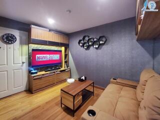 Modern living room with entertainment center and couch