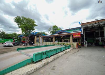 Exterior of a commercial building with a weighbridge