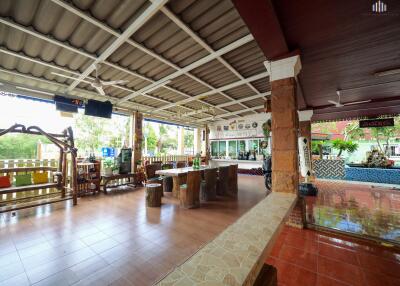 Spacious outdoor living area with seating and amenities