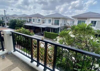 View from balcony overlooking residential neighborhood