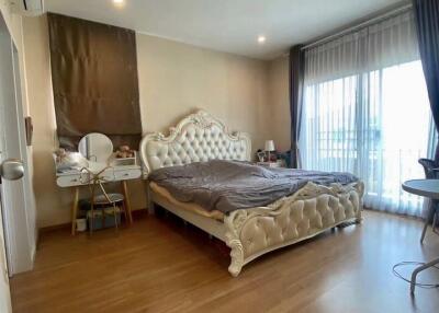 Elegant bedroom with ornate bed and vanity