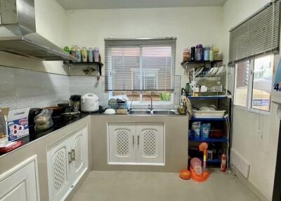 Modern kitchen with appliances and shelving