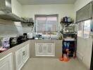 Modern kitchen with appliances and shelving