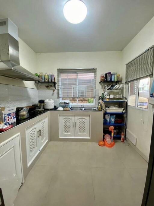 Modern kitchen with appliances and shelving