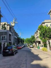 Street view of residential area with multi-story buildings