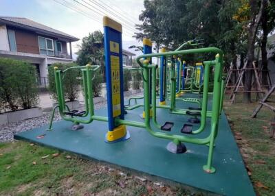 Outdoor exercise area with fitness equipment