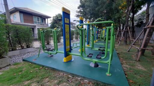 Outdoor exercise area with fitness equipment