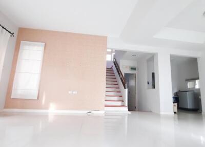 Bright main living area with staircase